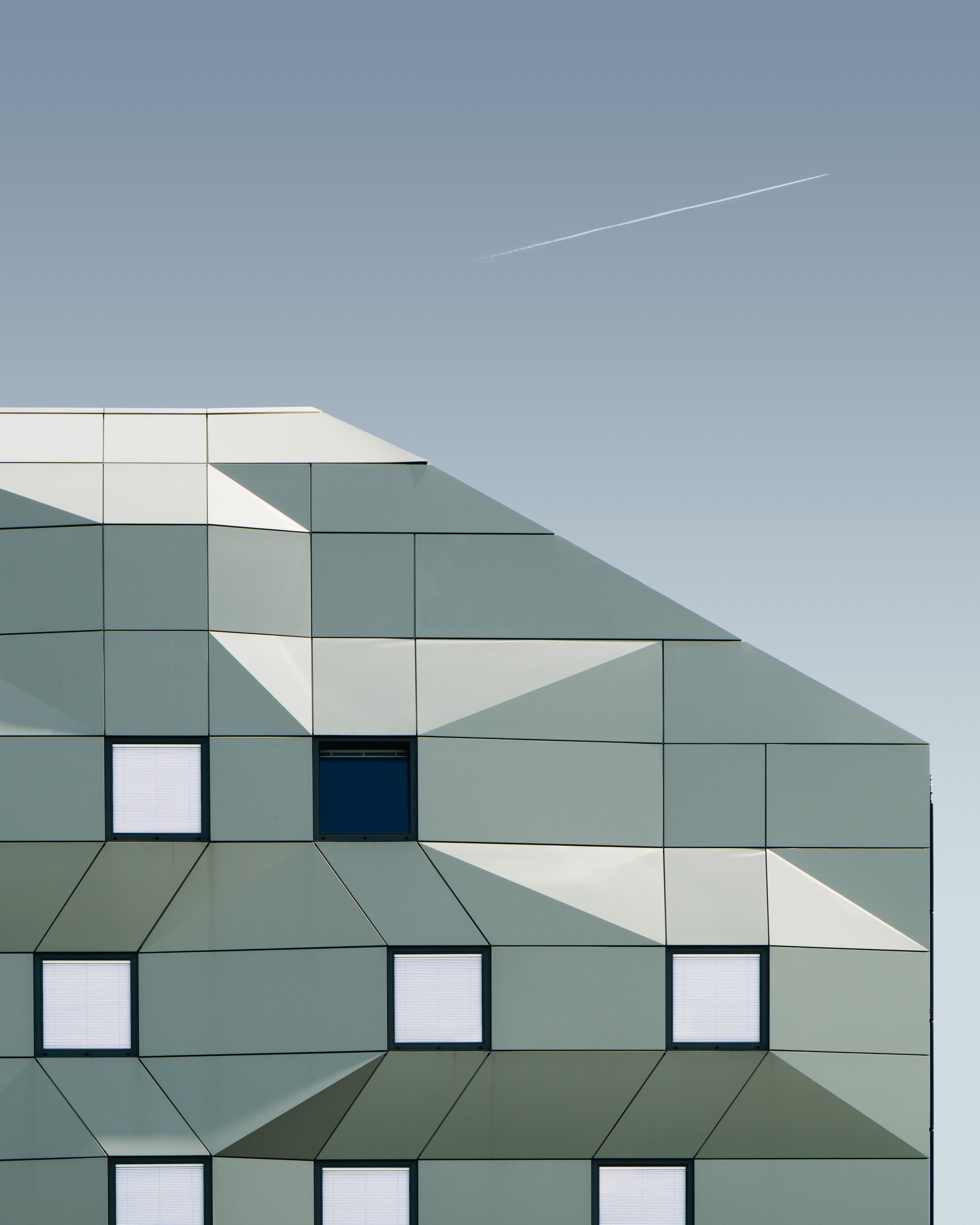 Geometric modern facade with repeated window pattern